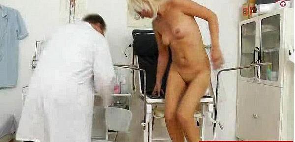  Blond dame gets a gyno test